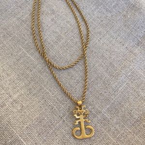 Peruvian gold pendant necklace.